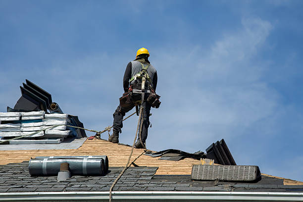 Professional Roofing technician working in Pacific City, OR